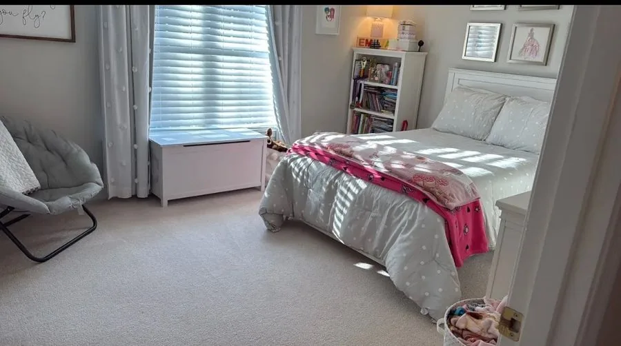 Bright, freshly cleaned bedroom after a residential cleaning in Worcester
